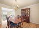 Elegant dining room with a chandelier and classic wooden furniture at 7197 S Newland St, Littleton, CO 80128