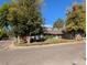 Traditional home with dormer windows and a well-kept front yard in a residential neighborhood at 7197 S Newland St, Littleton, CO 80128