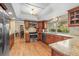 Well-equipped kitchen with custom cabinetry and granite countertops at 7197 S Newland St, Littleton, CO 80128