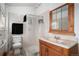 Bathroom with tiled shower and marble sink at 2015 Elmira St, Aurora, CO 80010