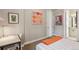Stylish bedroom featuring contemporary decor, plush carpeting, artwork, and a comfortable bed at 1012 Bannock St, Denver, CO 80204