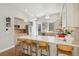 Modern kitchen features a quartz counter and stainless steel appliances at 1012 Bannock St, Denver, CO 80204