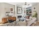 Bright living room features fireplace, large windows, and modern decor at 1012 Bannock St, Denver, CO 80204