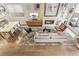 Bright, modern living room featuring a fireplace, comfortable seating, and an area rug at 1012 Bannock St, Denver, CO 80204