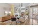 Cozy living room with fireplace, entertainment center and stylish decor at 1012 Bannock St, Denver, CO 80204
