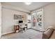 Bright home office with a desk, storage, and access to a balcony at 1012 Bannock St, Denver, CO 80204