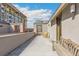 Spacious rooftop deck with bench seating, a building view, and colorful outdoor chairs at 1012 Bannock St, Denver, CO 80204