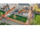 Aerial view of a private backyard with a deck, hot tub, and mature landscaping at 5900 Haywagon Ln, Castle Rock, CO 80108