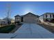 Well-maintained single-Gathering home with a large driveway and inviting curb appeal at 5900 Haywagon Ln, Castle Rock, CO 80108