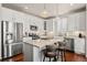 Modern kitchen with stainless steel appliances, island, and granite countertops at 5900 Haywagon Ln, Castle Rock, CO 80108