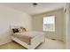 Bright bedroom with a single bed, a window with blinds and carpeted floors at 7081 S Oak Hill Cir, Aurora, CO 80016