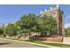 Attractive townhome exterior, lined with trees and offering a welcoming curb appeal at 3411 N Xenia St, Denver, CO 80238