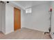 Finished basement features neutral colors and new light hardwood floors at 2797 S Newton Way, Denver, CO 80236