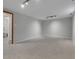 Spacious basement area with neutral carpeting and recessed lighting at 2797 S Newton Way, Denver, CO 80236