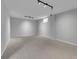 Spacious basement area with neutral carpeting and recessed lighting at 2797 S Newton Way, Denver, CO 80236