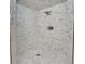 Updated shower features marble style tile, modern fixtures, dual shower heads and new fixtures at 2797 S Newton Way, Denver, CO 80236