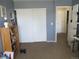 Bedroom featuring natural light, neutral walls, and a large closet at 8781 N Pierce Way # 102, Arvada, CO 80003