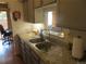 Kitchen view looking into the living room at 8781 N Pierce Way # 102, Arvada, CO 80003