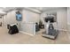 Basement features a workout area, a treadmill and an arcade game at 2342 Hickory Pl, Erie, CO 80516