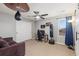 Bedroom featuring punching bag and speed bag, ideal for a home gym, and a ceiling fan at 2342 Hickory Pl, Erie, CO 80516