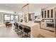 Bright, open kitchen with large island, modern appliances, and sleek cabinetry at 374 S Humboldt St, Denver, CO 80209