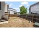 Spacious backyard featuring a wooden fence and room for outdoor activities at 19524 Montview Dr, Aurora, CO 80011
