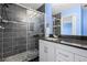 Contemporary bathroom with a glass-enclosed shower and modern vanity at 19524 Montview Dr, Aurora, CO 80011