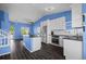 A modern kitchen with stainless steel appliances, granite countertops, and a center island at 19524 Montview Dr, Aurora, CO 80011