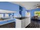 Bright, open kitchen with a large island, stainless steel appliances, and modern finishes at 19524 Montview Dr, Aurora, CO 80011