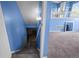 Staircase view into carpeted basement area and upper level at 19524 Montview Dr, Aurora, CO 80011