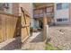 Private patio area with a grill and seating for relaxing outdoors at 2835 S Monaco Pkwy # 1-103, Denver, CO 80222