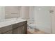 Neutral toned bathroom featuring vanity with a toilet and bathtub at 20871 E 60Th Ave, Aurora, CO 80019