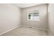 Bright bedroom with neutral carpet and a view from the window at 20871 E 60Th Ave, Aurora, CO 80019