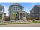Charming two-story home featuring stone accents and manicured landscaping at 20871 E 60Th Ave, Aurora, CO 80019