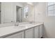 Elegant bathroom with double vanity, quartz countertop and modern fixtures at 554 Penn Rd, Elizabeth, CO 80107