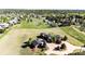 Aerial view of the property with a large yard and a detached garage at 6191 S Olathe St, Centennial, CO 80016