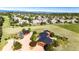 Aerial view of the property with a large yard and mountain views at 6191 S Olathe St, Centennial, CO 80016