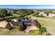 A captivating aerial view showcases the property's patio, yard, and surrounding greenery at 6191 S Olathe St, Centennial, CO 80016