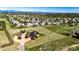 Aerial view of the property with a large yard and a detached garage at 6191 S Olathe St, Centennial, CO 80016