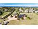 Aerial view of the property with a large yard and mountain views at 6191 S Olathe St, Centennial, CO 80016