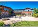 The backyard features a stone fire pit and patio furniture at 6191 S Olathe St, Centennial, CO 80016