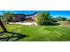 A huge backyard has artificial turf and plenty of space to play at 6191 S Olathe St, Centennial, CO 80016