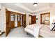 Bedroom with wood trim and built-in shelves at 6191 S Olathe St, Centennial, CO 80016