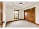 Bedroom with carpet and a window view at 6191 S Olathe St, Centennial, CO 80016