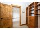 Spacious walk-in closet with custom shelving and drawers for organized storage at 6191 S Olathe St, Centennial, CO 80016
