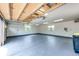 An oversized three car garage with skylights and exterior windows at 6191 S Olathe St, Centennial, CO 80016