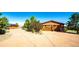 Spacious four car garage with wood doors and concrete driveway at 6191 S Olathe St, Centennial, CO 80016
