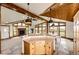 Bright kitchen with granite counters, natural wood cabinets, eat-in table, and great views at 6191 S Olathe St, Centennial, CO 80016