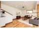 Comfortable living room featuring hardwood floors, a cozy seating area, and modern decor at 6191 S Olathe St, Centennial, CO 80016