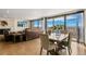 Open-concept dining area with scenic views and an elegant dining set at 1020 15Th St # 42A, Denver, CO 80202